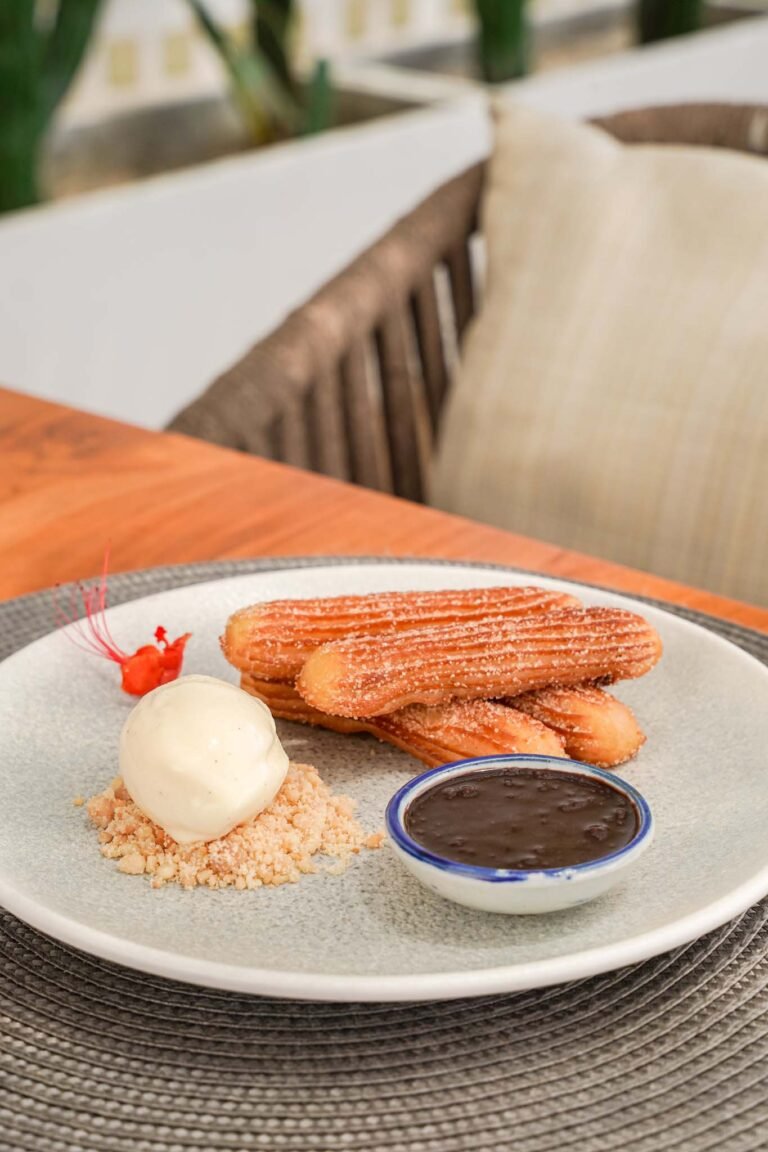 House made churros with Valrhona Jivara 40% milk chocolate sauce.