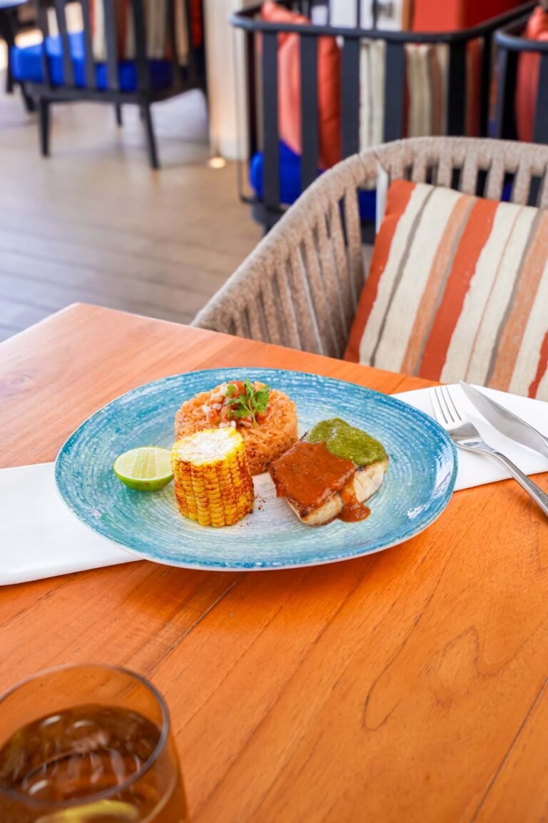 Grilled seabass smeared with salsa verde and aji rojo. Served with Mexican rice